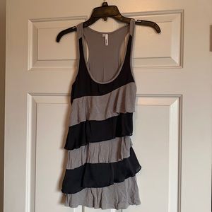 Sleeveless black and gray ruffled top